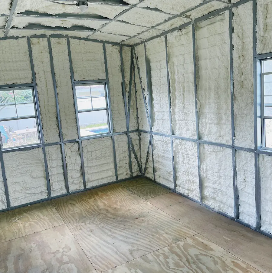 Closed-cell spray foam insulation applied to wall cavities in a residential project in University Park